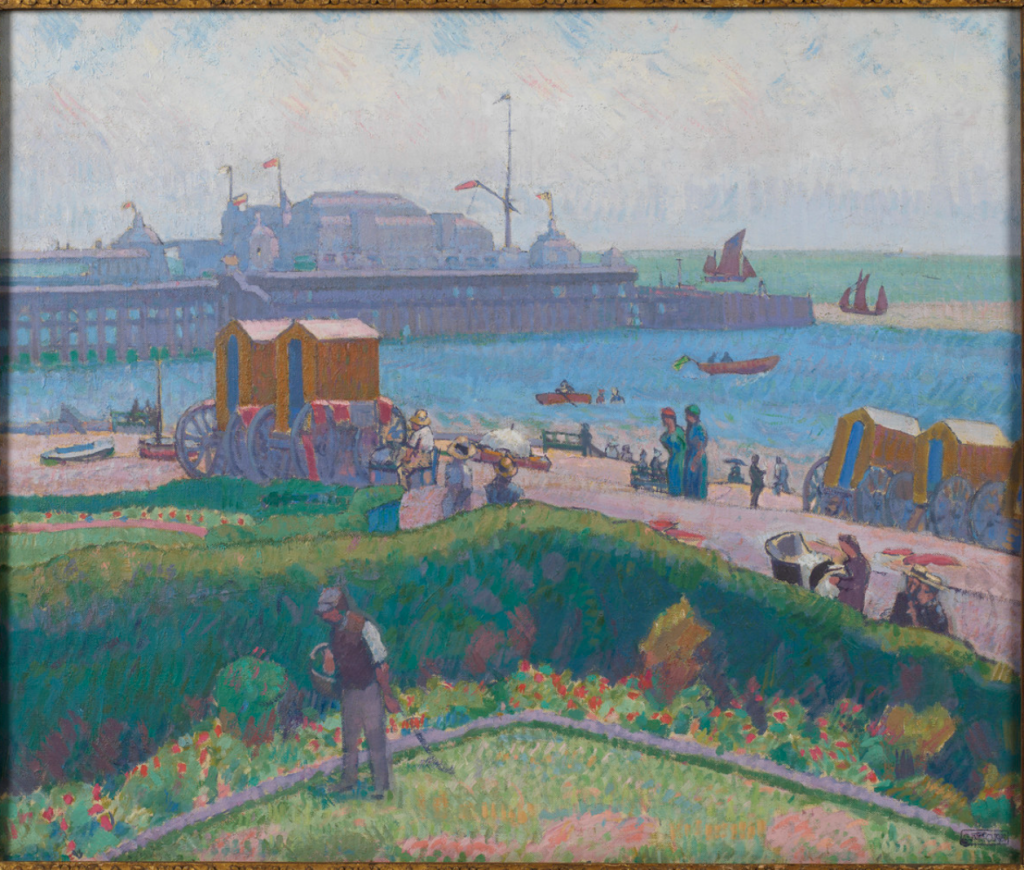 The West Pier by Spencer Gore. An oil painting showing the gardens in the foreground, then the beach, with bathing huts, then the pier mauve against a bright blue sea. Stunning colours.
